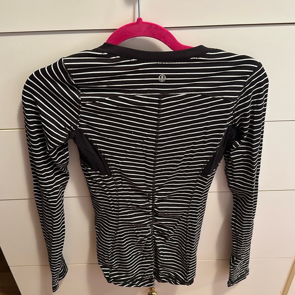 Lululemon on long sleeve exercise top. Breathable material in armpits into back. - Picture 1 of 4